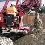 Drilling fence post holes